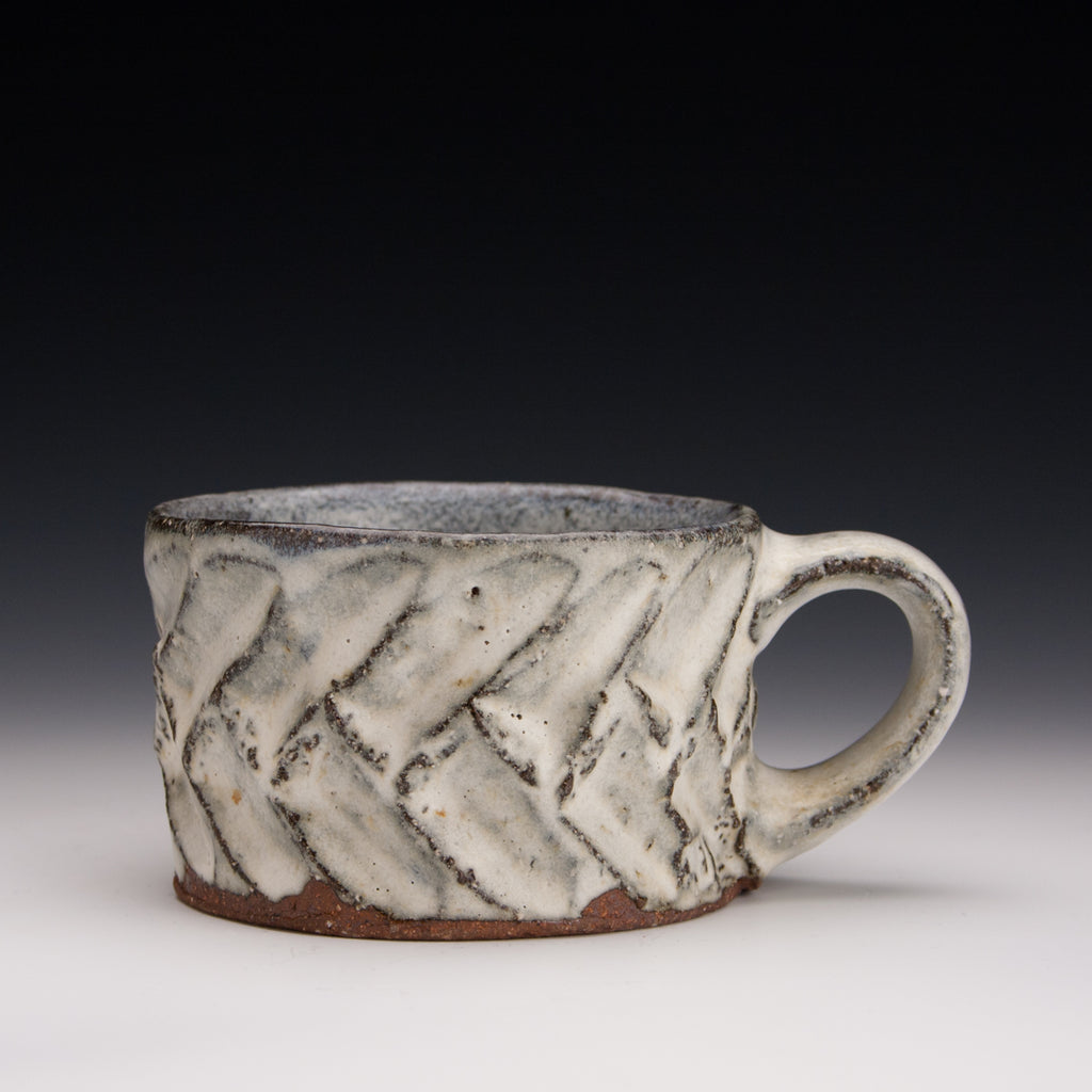 Carved nuka mug