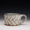 Carved nuka mug
