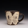 Iron and White slip mug